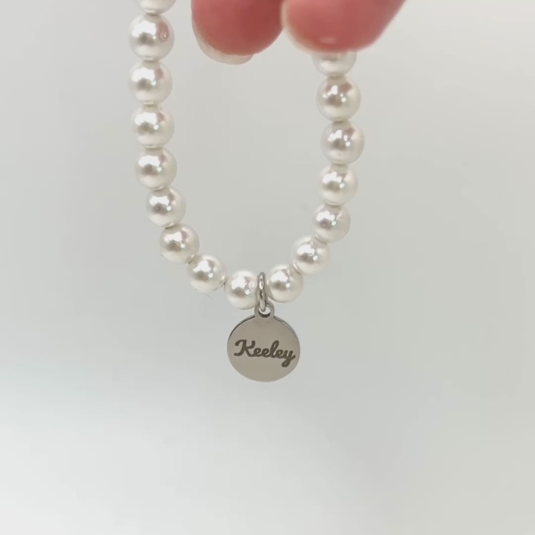 Load video: Shell Pearl Bracelet with Disc