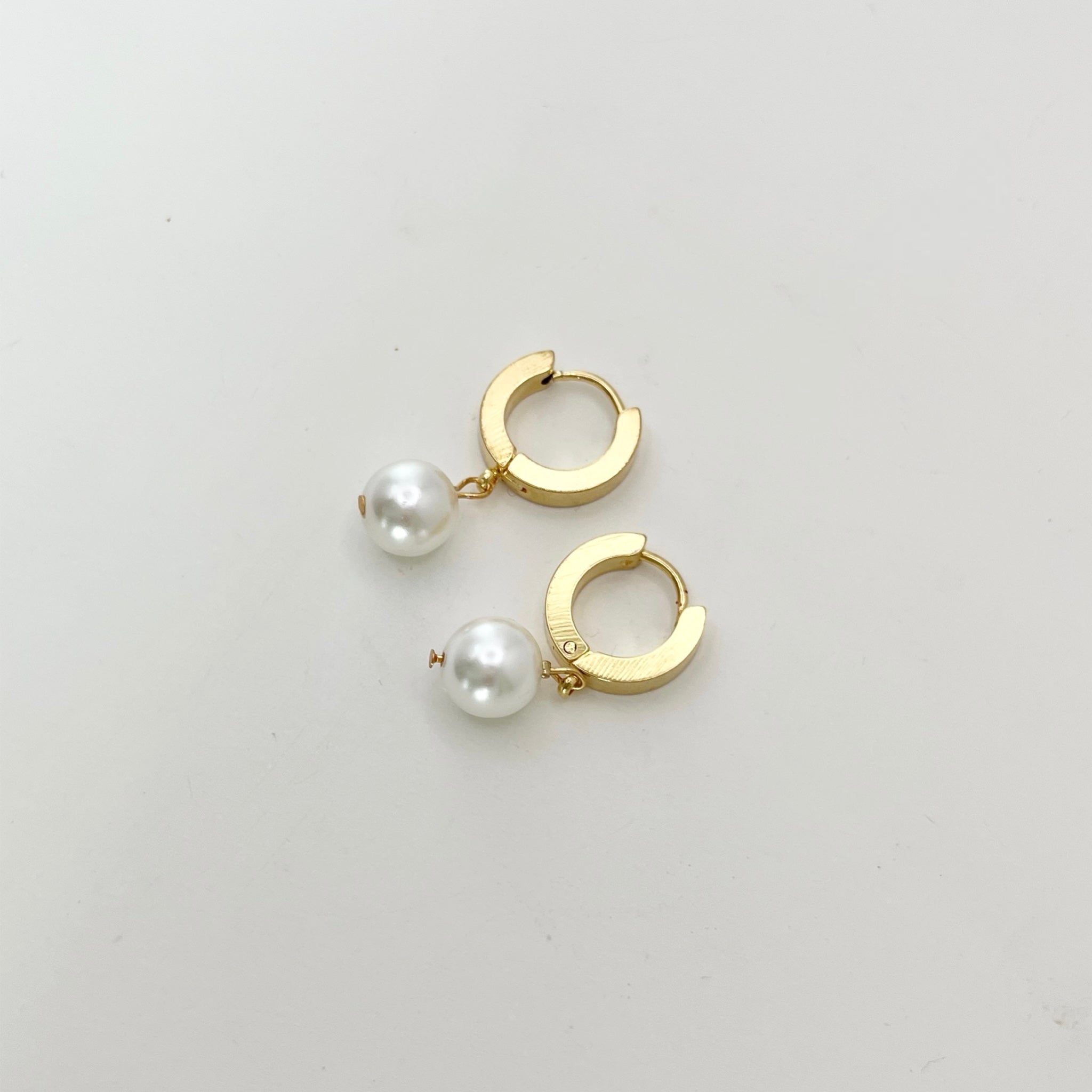 Stainless Steel Huggie Earrings with Pearl Charm