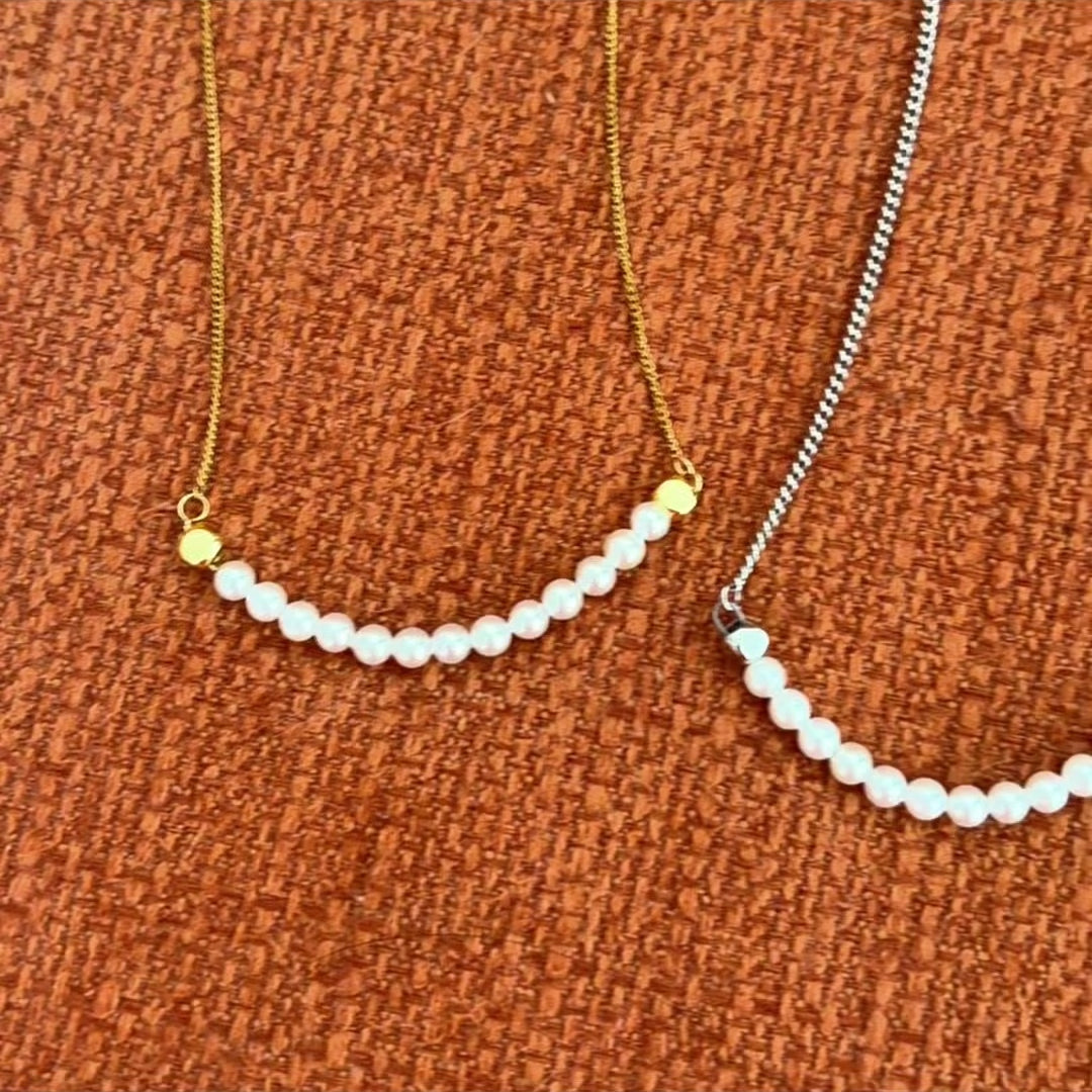 Load video: Minimalist 4mm Curved Shell Pearl Row Necklace